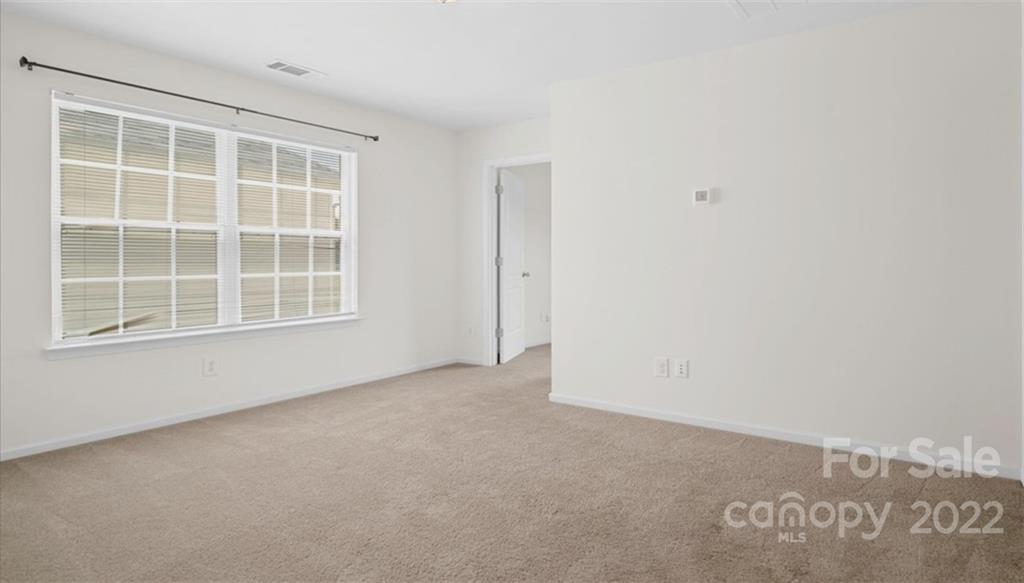 1224 Afternoon Sun Road Matthews, NC 28104 - Photo 15 of 22 a view of an empty room with a window