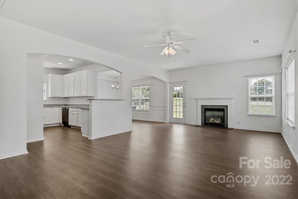 1224 Afternoon Sun Road Matthews, NC 28104 - Photo 10 of 22 a view of a kitchen with furniture and a kitchen