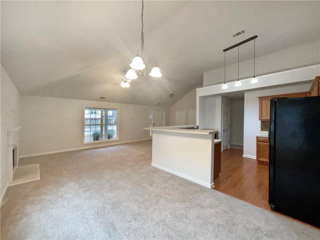 5945 Raventree Court Atlanta, GA 30349 - Photo 14 of 27 a view of a kitchen with a sink and a window