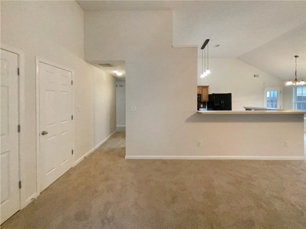 5945 Raventree Court Atlanta, GA 30349 - Photo 16 of 27 a view of a kitchen with a sink