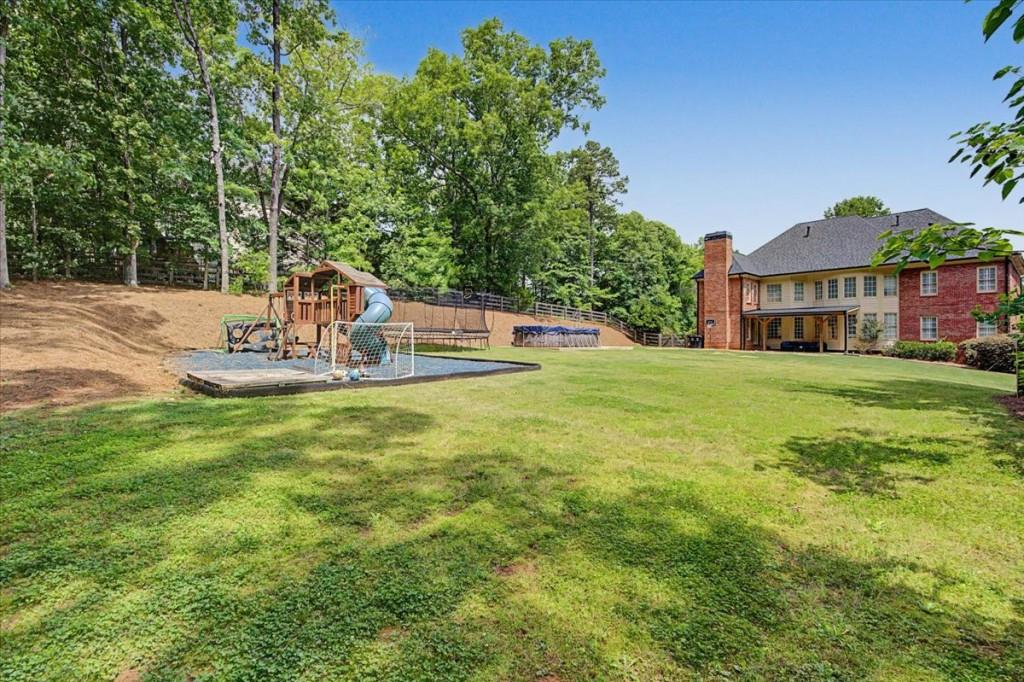 122 Ridge View Drive Ball Ground, GA 30107 - Photo 68 of 84 a view of a house with a big yard