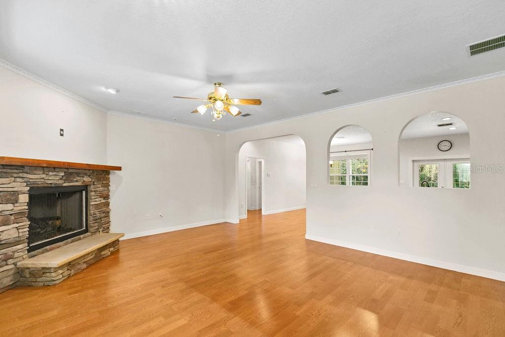 2691 Phillips Road Christmas, FL 32709 - Photo 13 of 38 a view of an empty room with a fireplace