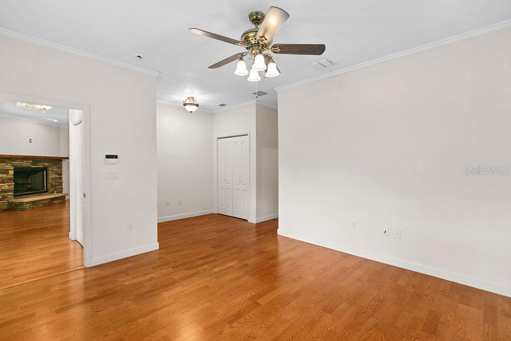 2691 Phillips Road Christmas, FL 32709 - Photo 18 of 38 a view of an empty room with wooden floor