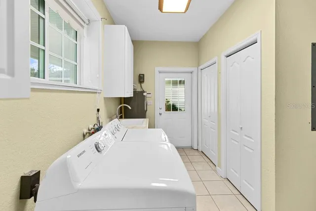 a room with a bed and a window