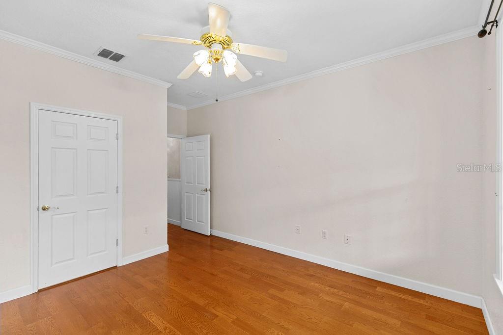 2691 Phillips Road Christmas, FL 32709 - Photo 27 of 38 an empty room with a empty space and a ceiling fan