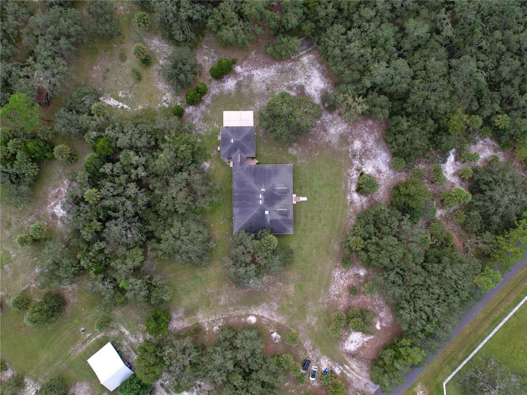 2691 Phillips Road Christmas, FL 32709 - Photo 34 of 38 an aerial view of a house with a yard