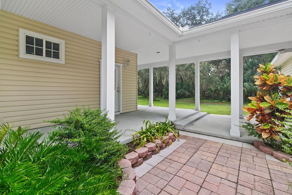 2691 Phillips Road Christmas, FL 32709 - Photo 9 of 38 a view of a garden with pathway