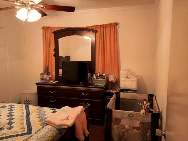 3822 Mattingham Drive Houston, TX 77066 - Photo 11 of 18 a bedroom with a bed and a mirror