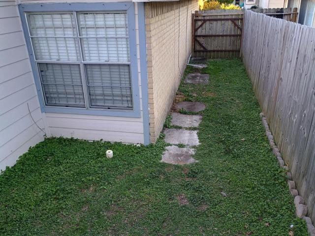 3822 Mattingham Drive Houston, TX 77066 - Photo 18 of 18 a view of house with backyard