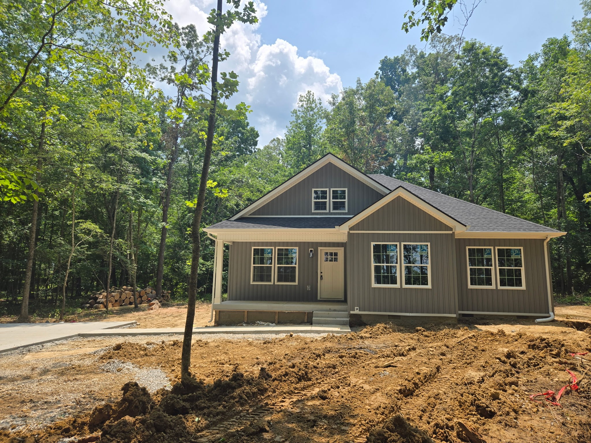 353 Mcelhiney Road Dickson, TN 37055 - Photo 1 of 1 a front view of a house with a yard