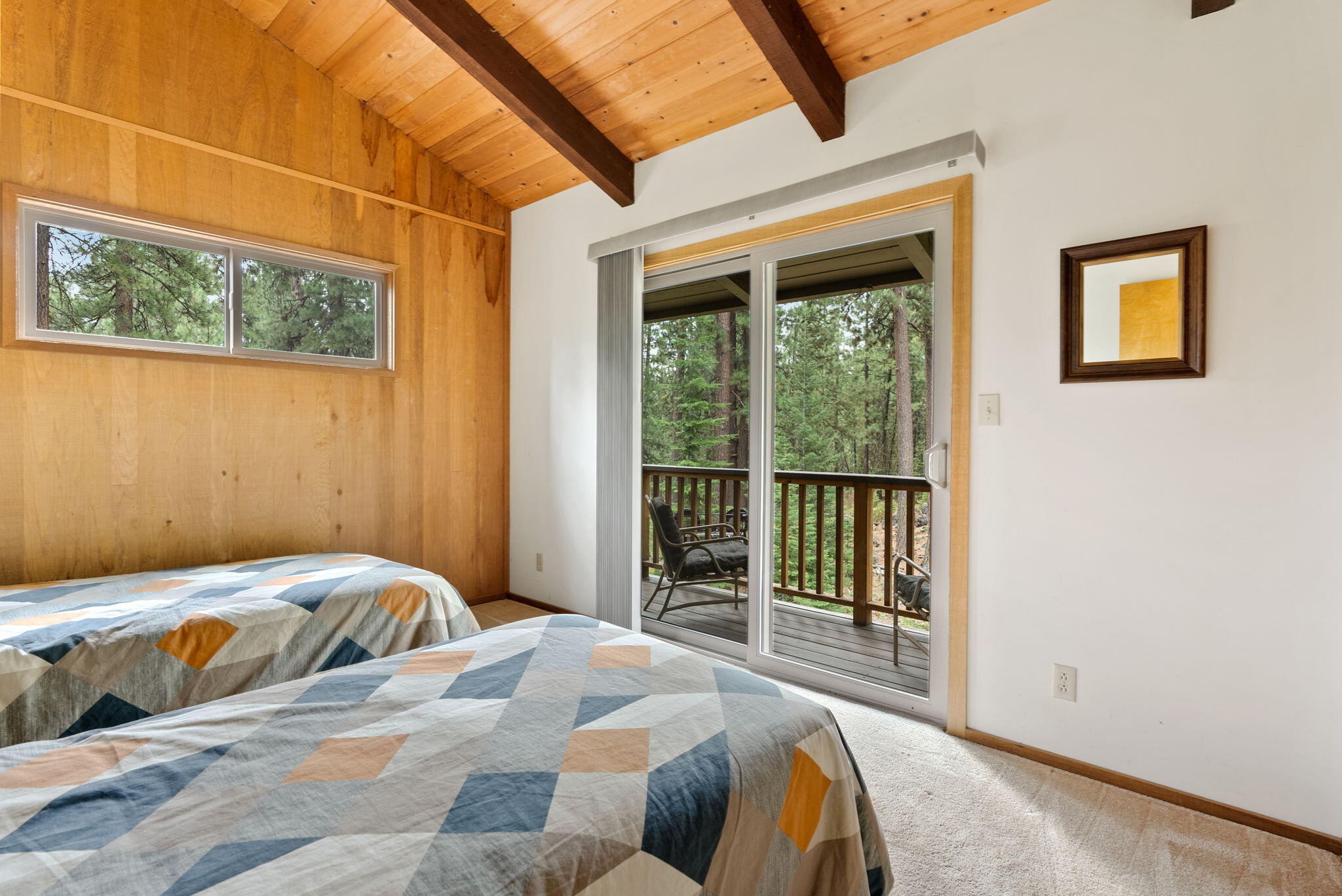13251 Snowbrush, Unit GH 266 Black Butte Ranch, OR 97759 - Photo 19 of 37 a bedroom with a bed and wooden floor