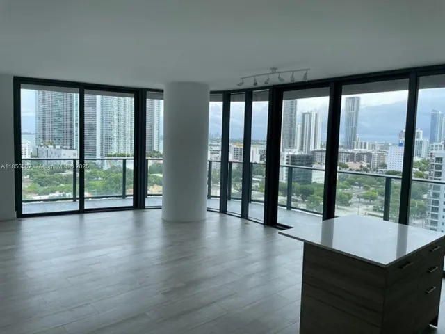 a view of a city with tall buildings