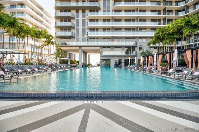 a view of a lake with a building next to a lake