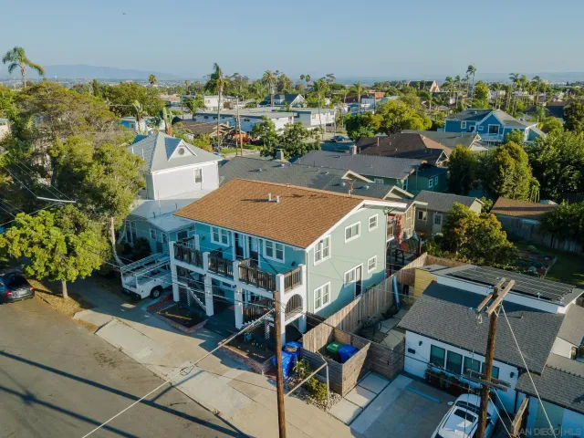 an aerial view of a house with a garden