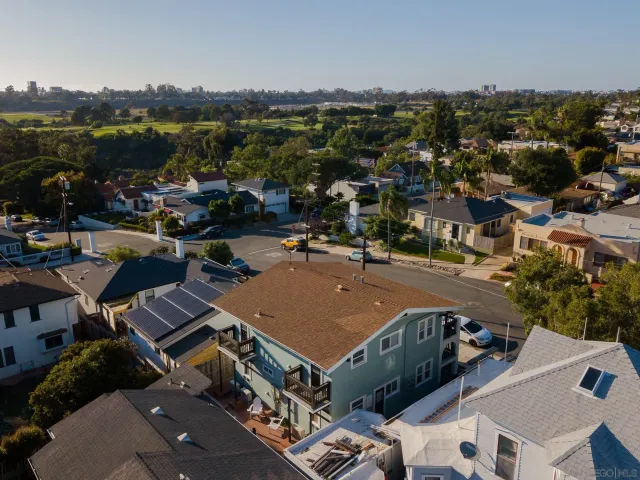 a view of a terrace with wooden benches