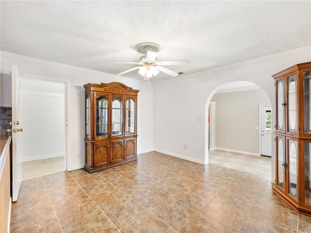 1686 Shoal Creek Road Monroe, GA 30656 - Photo 12 of 50 wooden floor in an empty room with a window