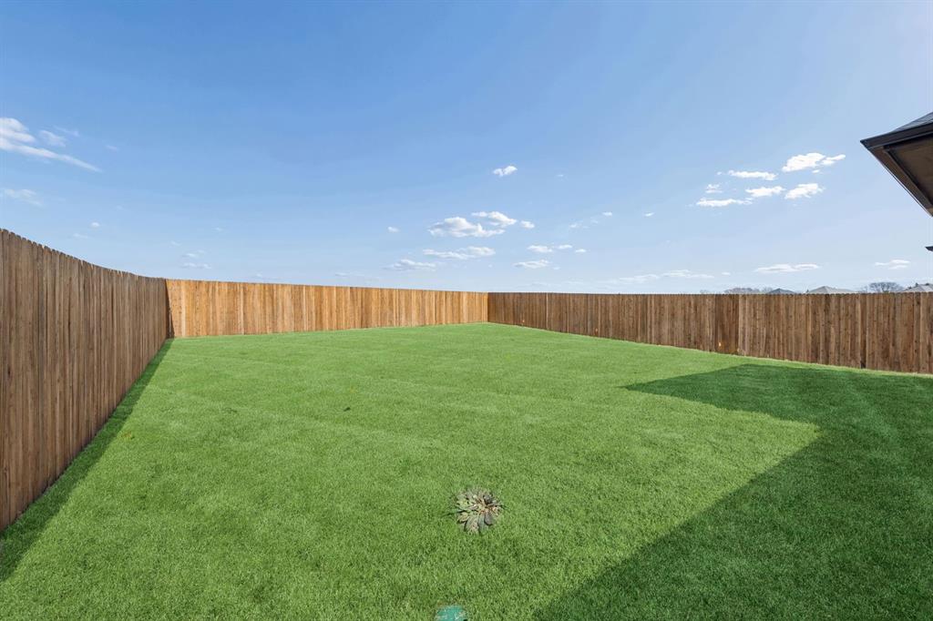 316 Millwood Road Lavon, TX 75166 - Photo 35 of 37 Covered Patio in the Oak II home plan by Trophy Signature Homes – REPRESENTATIVE PHOTO