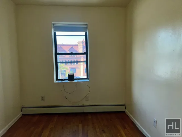 a view of front door with wooden floor