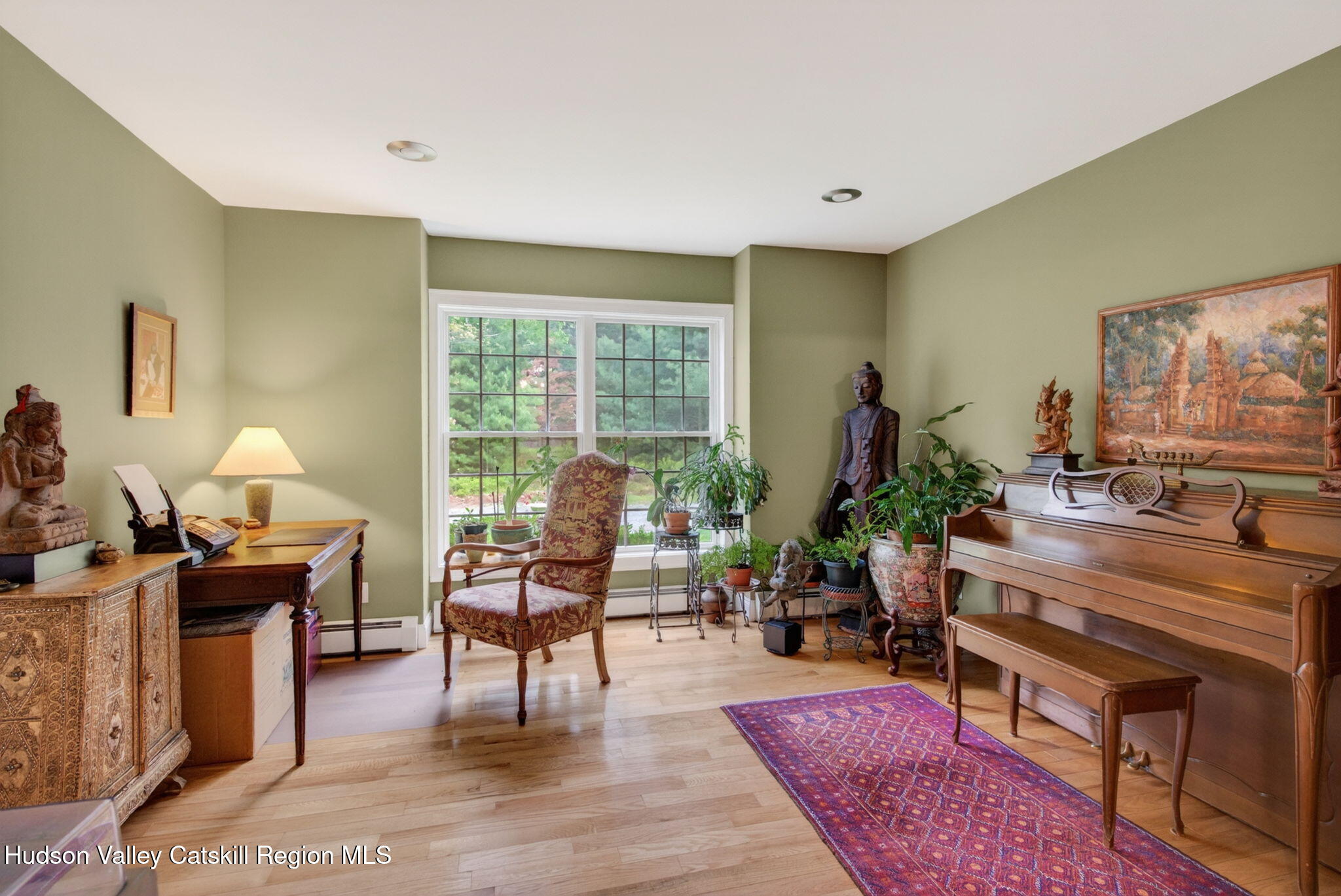189 Bush Road Stone Ridge, NY 12484 - Photo 19 of 60 a living room with furniture rug and wooden floor