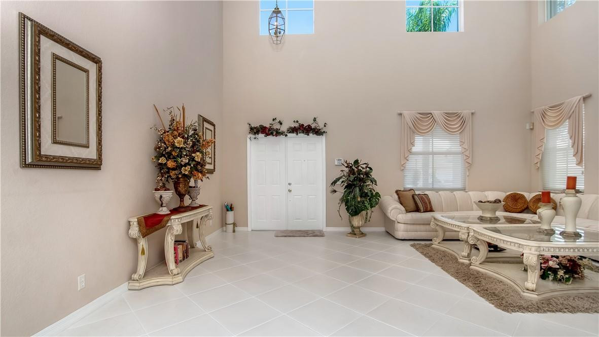 934 Crestview Circle Fort Lauderdale, FL 33327 - Photo 14 of 51 a living room with furniture and a potted plant