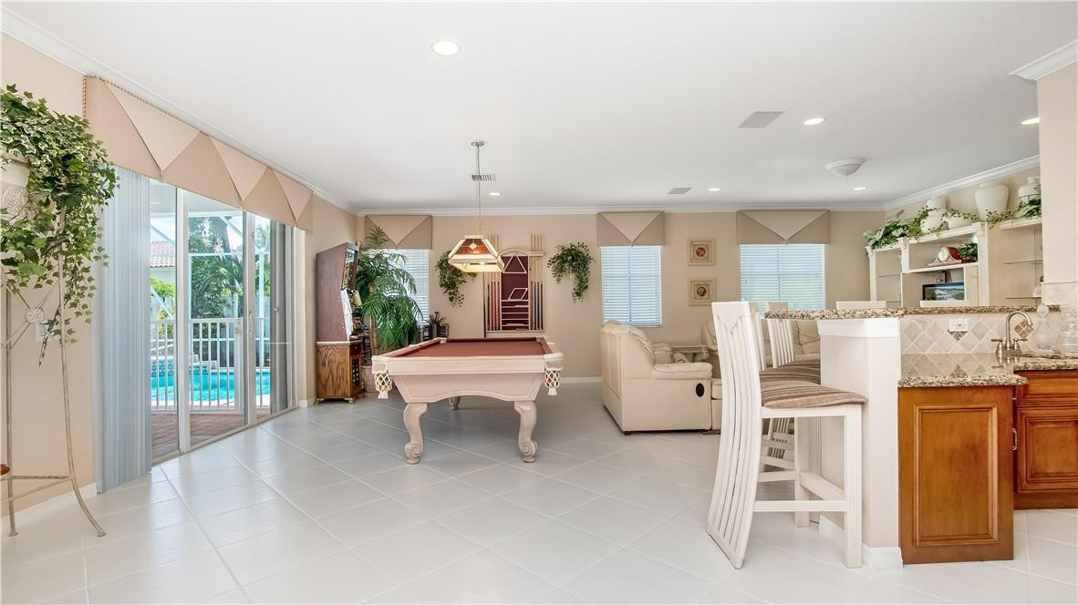 934 Crestview Circle Fort Lauderdale, FL 33327 - Photo 23 of 51 a living room with furniture and a large window