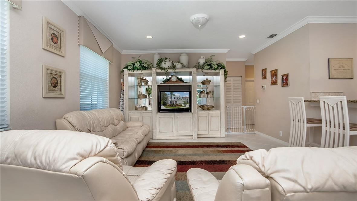 934 Crestview Circle Fort Lauderdale, FL 33327 - Photo 26 of 51 a bedroom with furniture and a fireplace