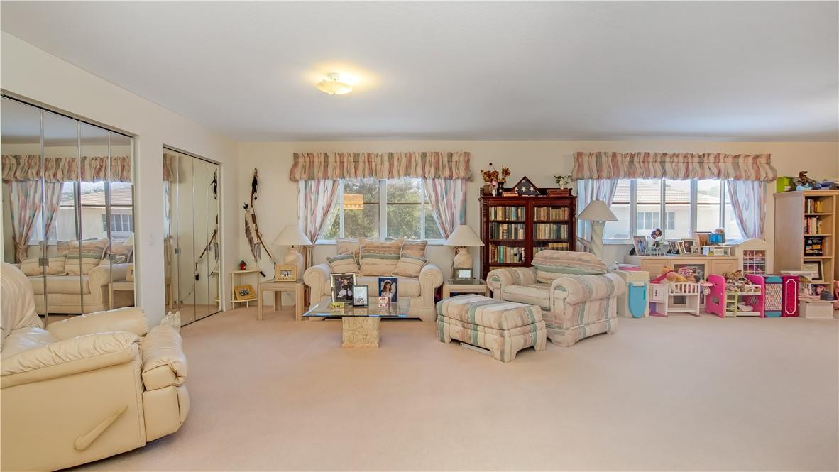934 Crestview Circle Fort Lauderdale, FL 33327 - Photo 30 of 51 a living room with furniture and a large window