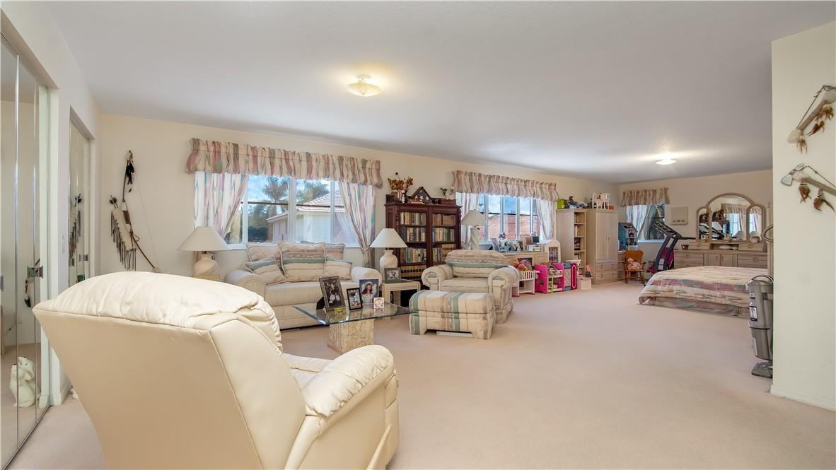 934 Crestview Circle Fort Lauderdale, FL 33327 - Photo 31 of 51 a living room with furniture and a large window