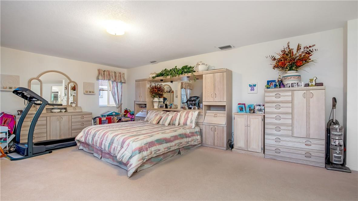 934 Crestview Circle Fort Lauderdale, FL 33327 - Photo 33 of 51 a bedroom with bed and white walls