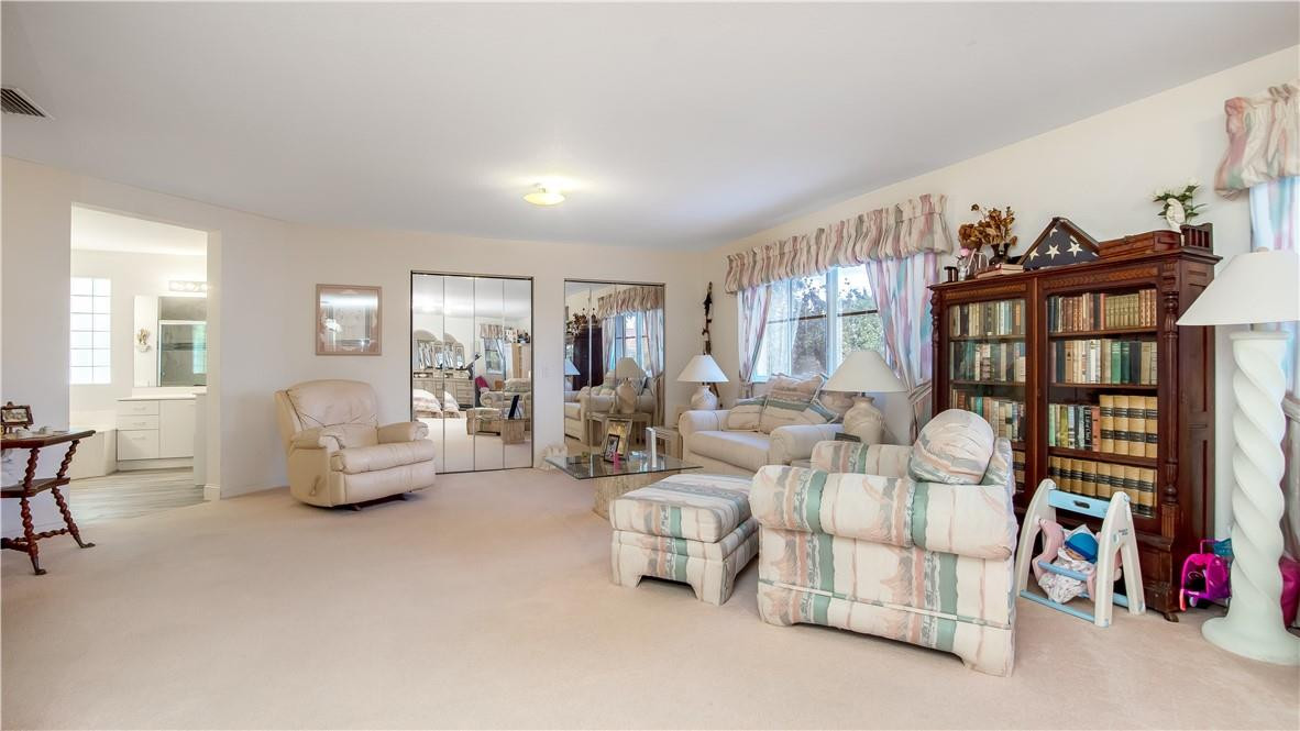 934 Crestview Circle Fort Lauderdale, FL 33327 - Photo 34 of 51 a living room with furniture gym equipment and a large window