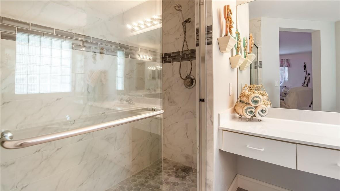 934 Crestview Circle Fort Lauderdale, FL 33327 - Photo 37 of 51 a bathroom with a sink and a mirror