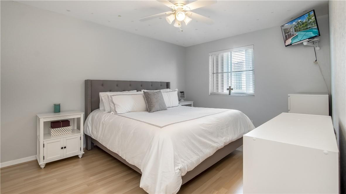 934 Crestview Circle Fort Lauderdale, FL 33327 - Photo 38 of 51 a bedroom with a bed and a window