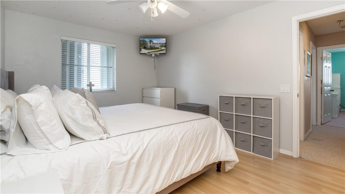 934 Crestview Circle Fort Lauderdale, FL 33327 - Photo 39 of 51 a bedroom with a bed and a window