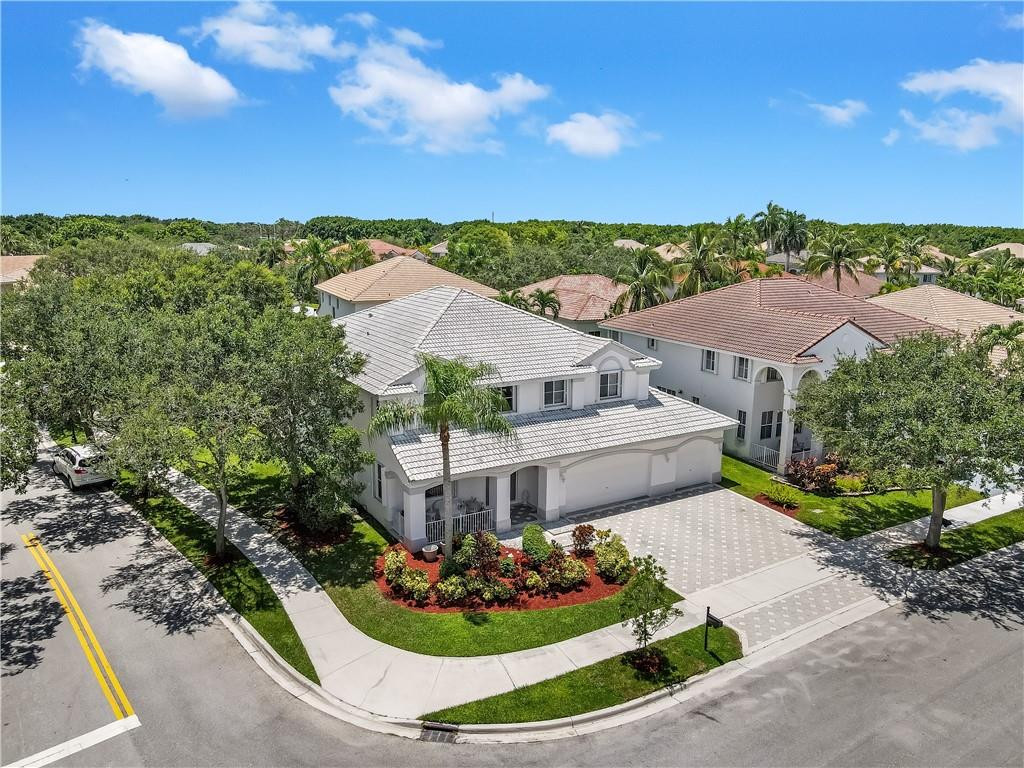 934 Crestview Circle Fort Lauderdale, FL 33327 - Photo 4 of 51 an aerial view of a house with a garden