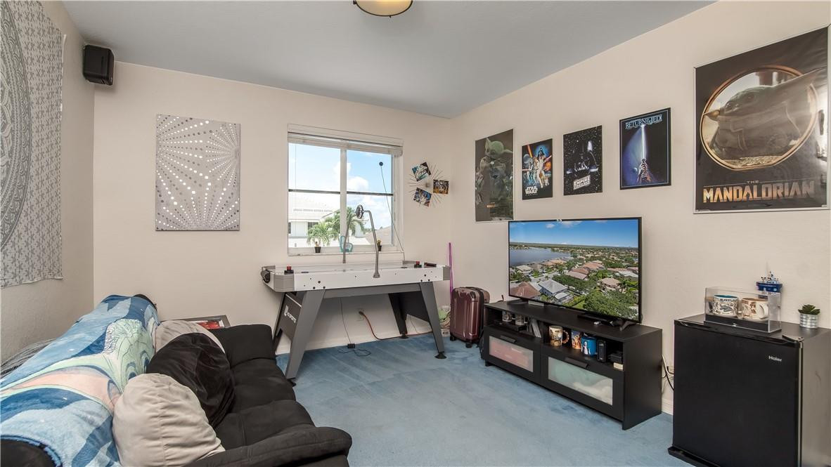 934 Crestview Circle Fort Lauderdale, FL 33327 - Photo 42 of 51 a living room with furniture and a fireplace