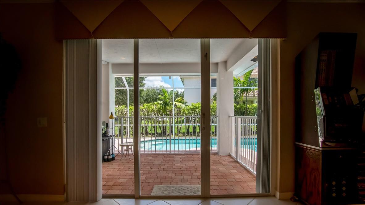 934 Crestview Circle Fort Lauderdale, FL 33327 - Photo 45 of 51 a view of a glass door and the balcony