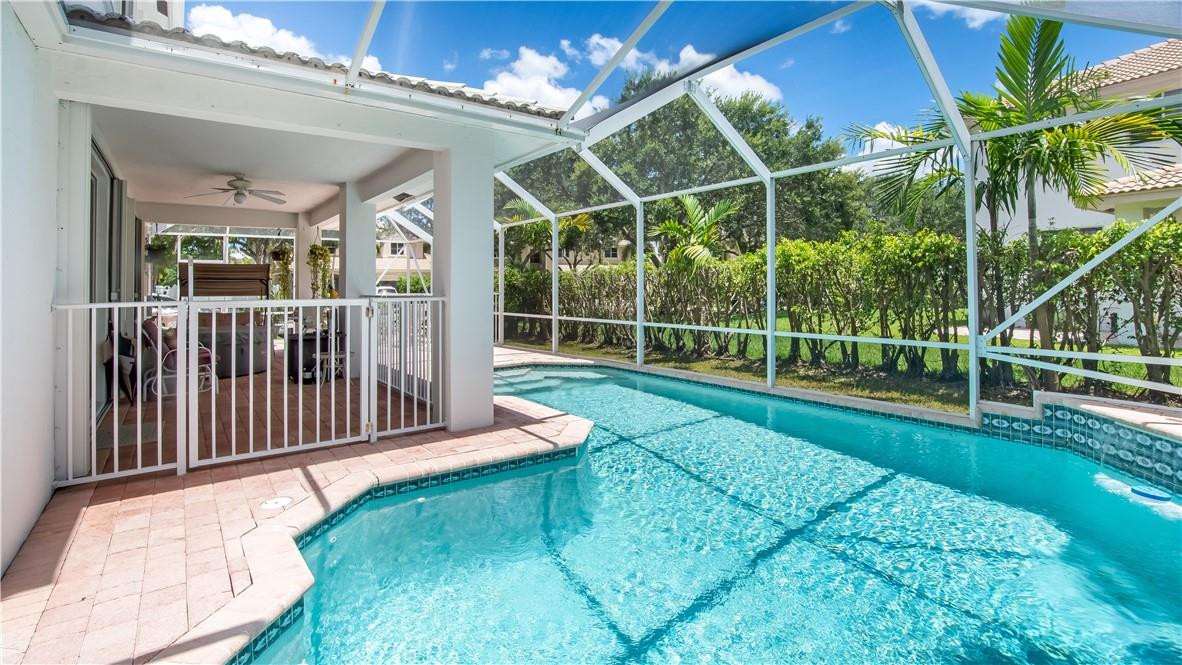 934 Crestview Circle Fort Lauderdale, FL 33327 - Photo 46 of 51 a view of a house with backyard and porch