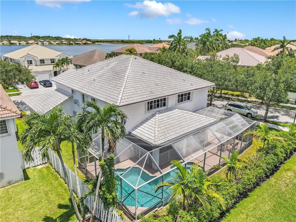 934 Crestview Circle Fort Lauderdale, FL 33327 - Photo 5 of 51 an aerial view of a house with a garden