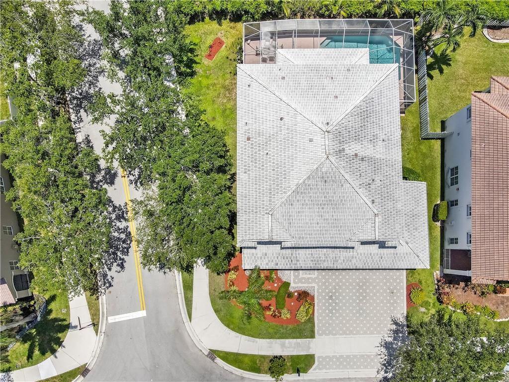 934 Crestview Circle Fort Lauderdale, FL 33327 - Photo 6 of 51 an aerial view of a house with a swimming pool