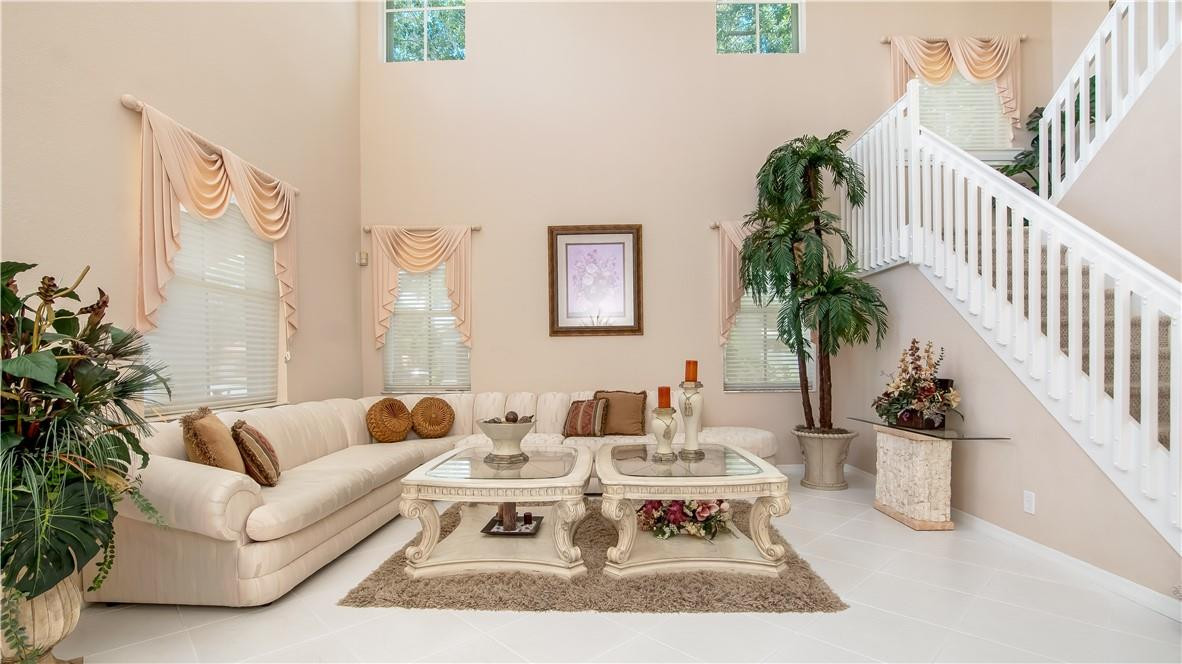 934 Crestview Circle Fort Lauderdale, FL 33327 - Photo 9 of 51 a living room with furniture and flowers