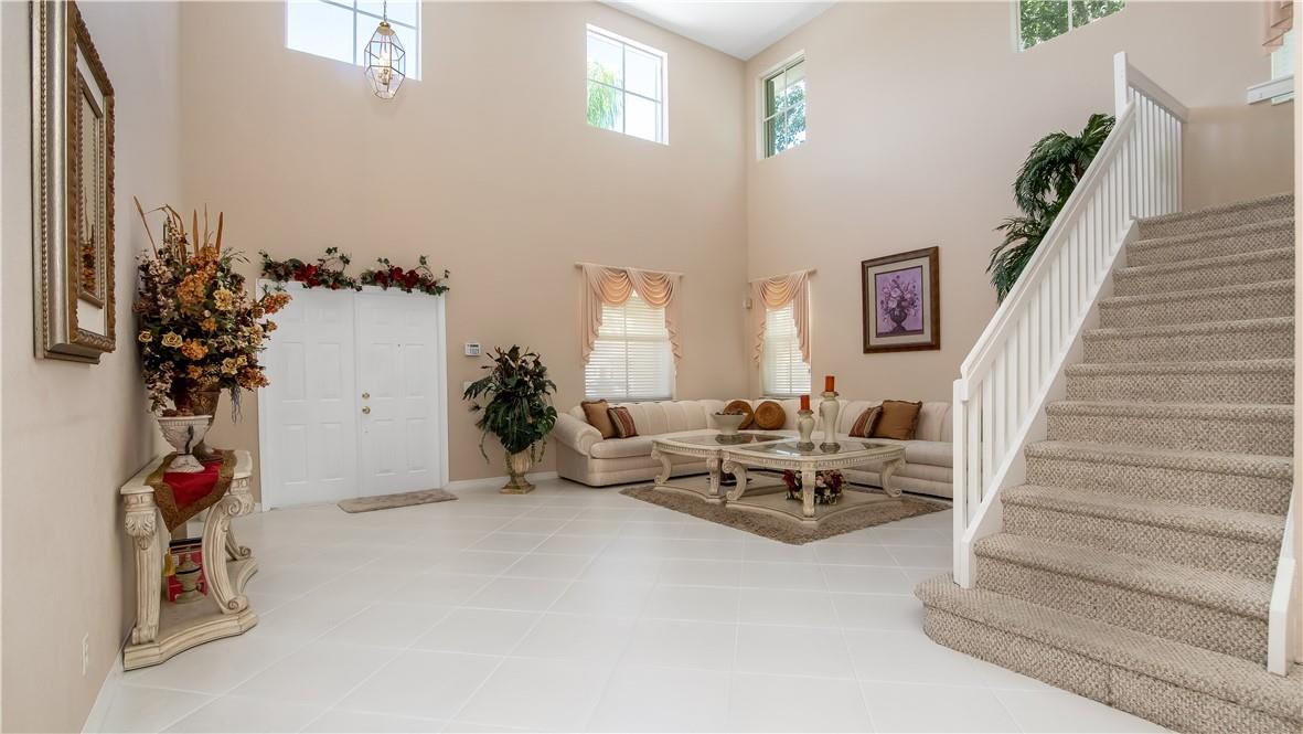 934 Crestview Circle Fort Lauderdale, FL 33327 - Photo 10 of 51 a living room with furniture gym equipment and potted plant