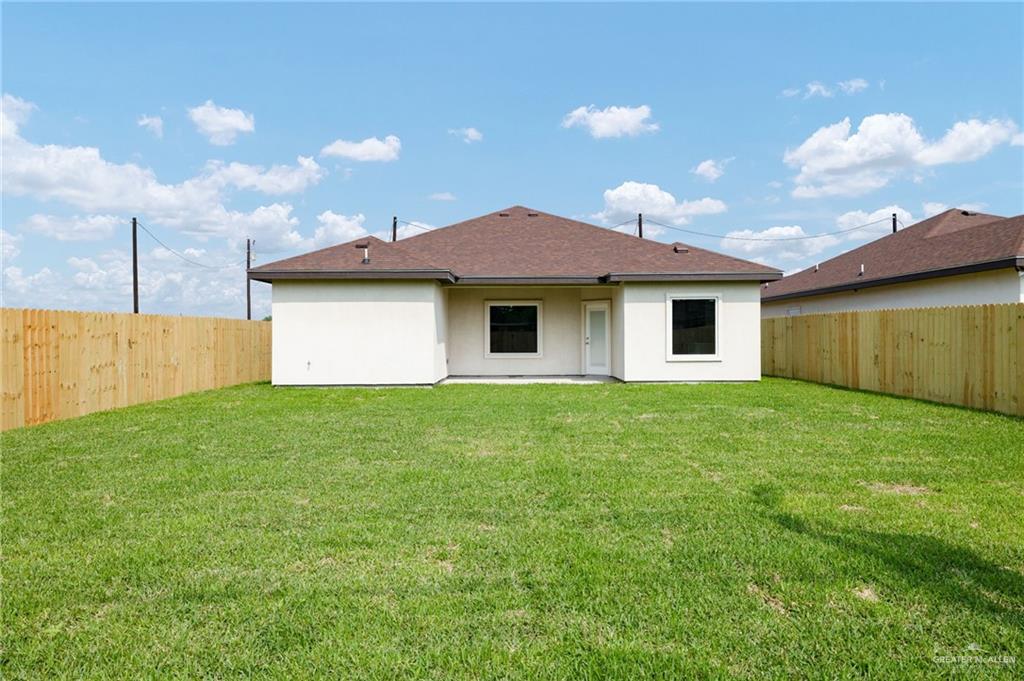 1717 Alisson Street Alton, TX 78573 - Photo 13 of 15 a view of a house with a backyard