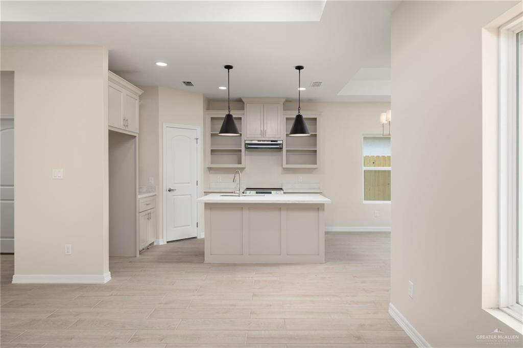 1717 Alisson Street Alton, TX 78573 - Photo 4 of 15 a view of kitchen with stainless steel appliances cabinets and window