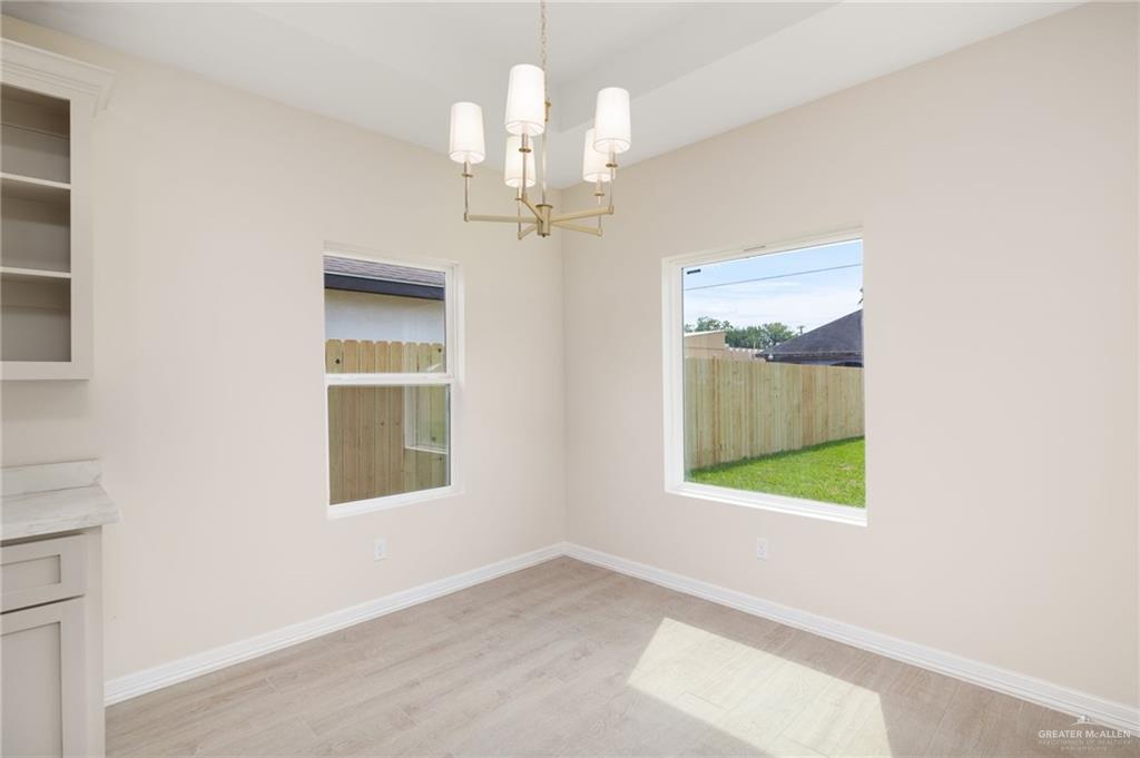 1717 Alisson Street Alton, TX 78573 - Photo 6 of 15 an empty room with a window