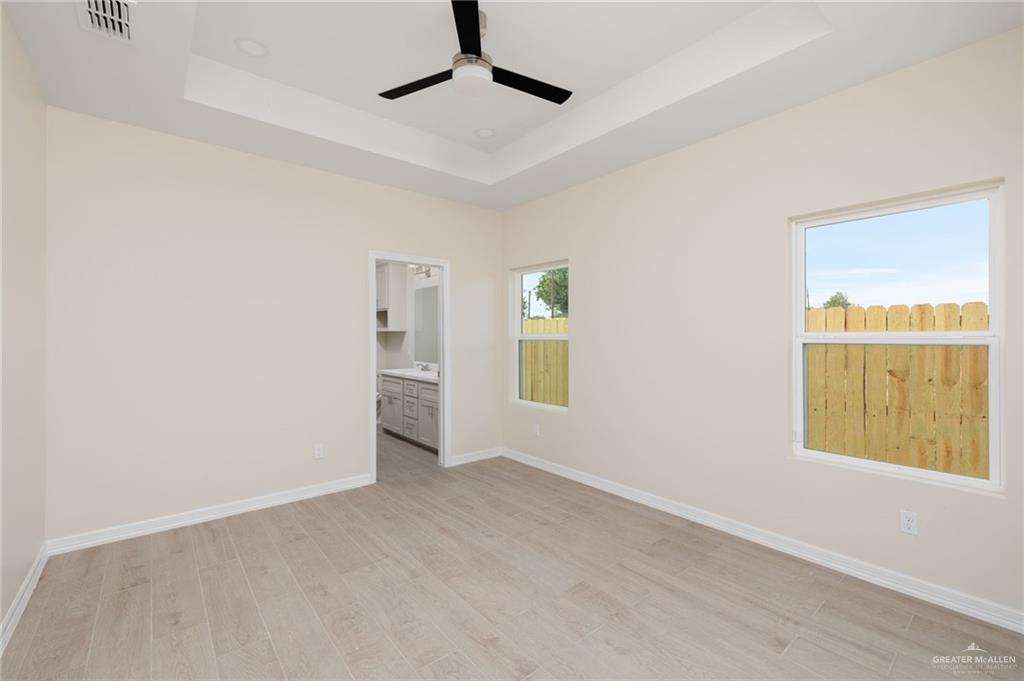 1717 Alisson Street Alton, TX 78573 - Photo 7 of 15 an empty room with windows