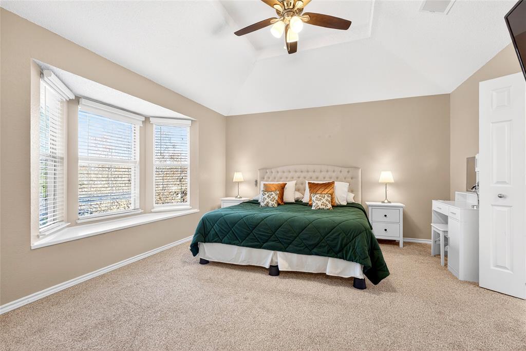1804 Hunters Ridge Drive Grapevine, TX 76051 - Photo 15 of 36 Primary bedroom with ample space and inviting window seat