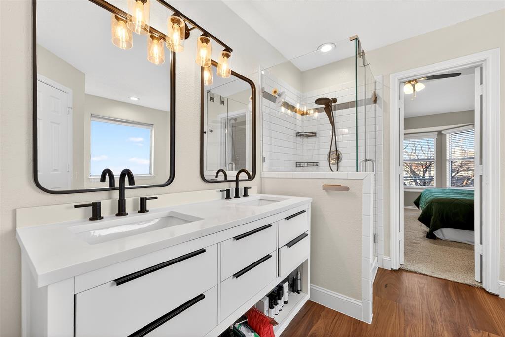 1804 Hunters Ridge Drive Grapevine, TX 76051 - Photo 17 of 36 Upgraded primary bathroom with duel sinks and stylish fixtures