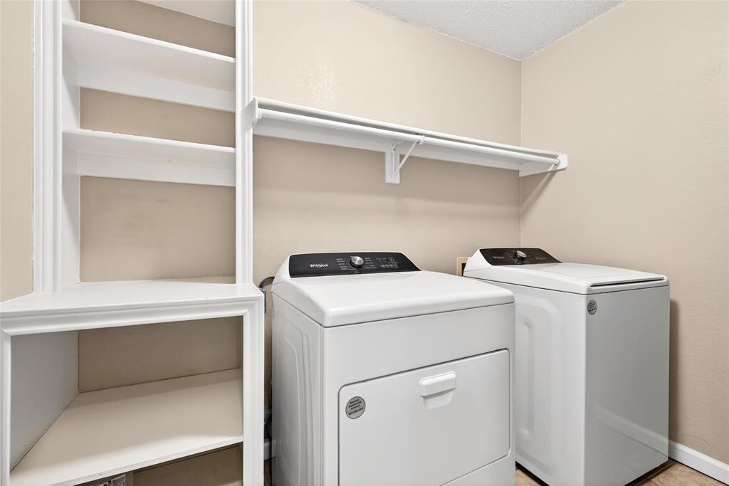 1804 Hunters Ridge Drive Grapevine, TX 76051 - Photo 25 of 36 Oversized laundry rom with storage shelves