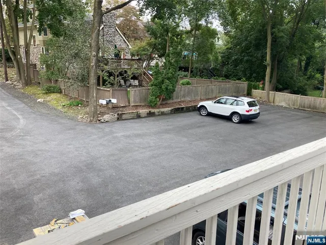a view of a car parked on the road
