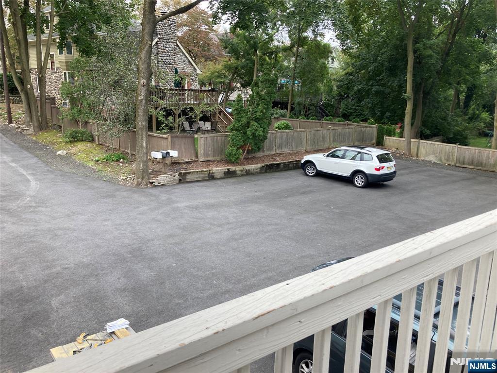 118 Doremus Avenue, Unit C Ridgewood, NJ 07450 - Photo 4 of 16 a view of a car parked on the road